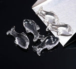 Load image into Gallery viewer, Crystal Quartz Dolphin Shape Carving, Clear Crystal Fish Shape Beads, Jewelry Making Fish Charms, 28 MM, Loose Sea Carved Stone