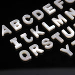 Load image into Gallery viewer, AAA Mother Of Pearl Alphabet Beads, A to Z 26 Pcs, Top Side Hole Drill Smooth Luster Pearl Gemstones, Mop Shell Letter for Jewelry, 10 MM