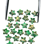 Load image into Gallery viewer, Hand Carved Green Mohave Turquoise Star Beads: 10mm Gemstone Charms