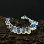 Load image into Gallery viewer, AAA Quality Flashy Rainbow Moonstone Smooth Pear Beads, 4 inch strand, Natural Blue Flash Rainbow Moonstone Pear Beads, 4X6 - 8X10 MM